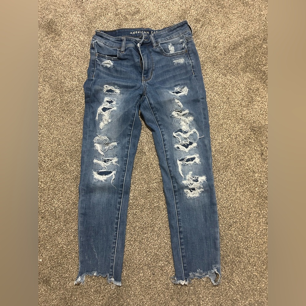 American Eagle Outfitters High-Rise Jeggings Crop. Distressed. Raw hem.